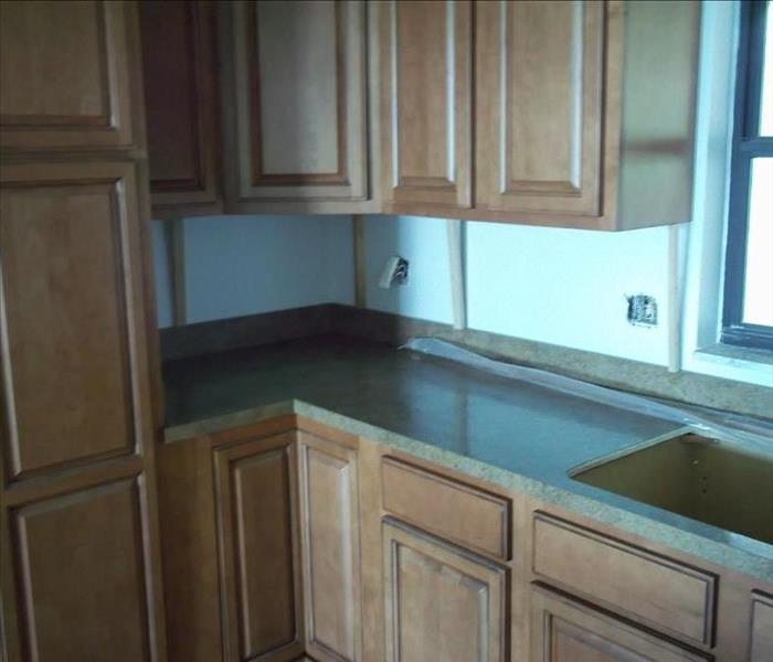 remodeled kitchen--new countertops, cabinets and sink
