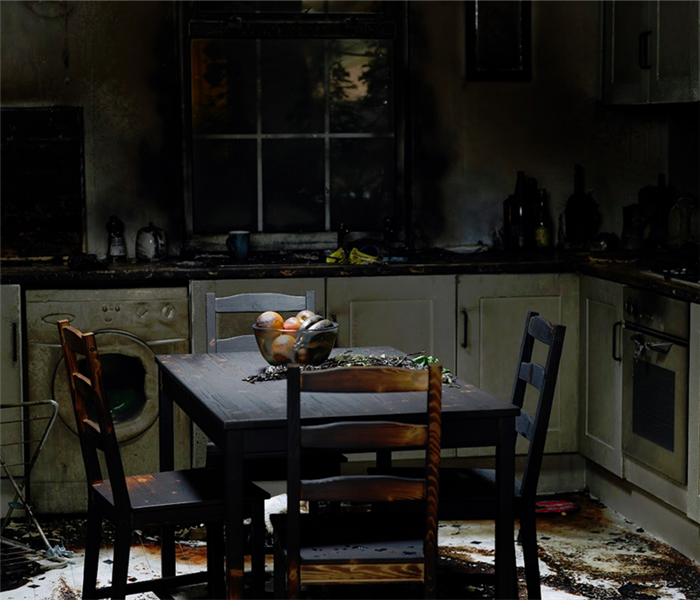 kitchen and a dinning set that was damaged by a fire