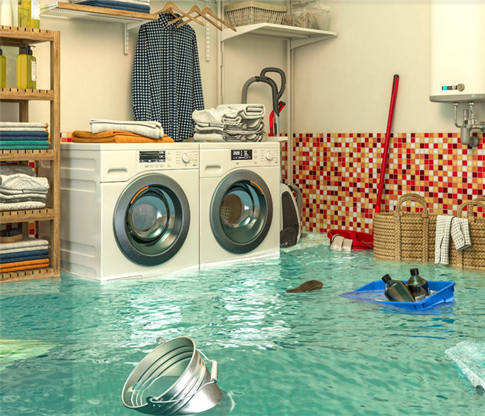 a flooded laundry room with many things floating in the water
